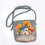 Turkmen artisan’s handmade Merino wool felt bag worn as shoulder bag