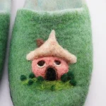 Dense hand-felted Merino wool texture on handmade slippers