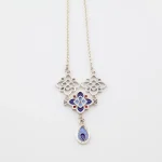 Luxury cloisonné enamel silver jewelry set featuring intricate blue floral patterns and teardrop pendants - Persian Minakari