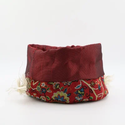 Luxury drawstring Termeh pouch fully open showing glossy burgundy satin lining