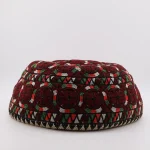 Full view of 70-year-old Yomut Atabay Turkmen embroidered skullcap – deep red with Boustan Gardi circles