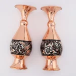Detail shot of polished copper bird and flower designs – Isfahan craftsmanship
