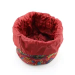Burgundy Persian Termeh jewelry pouch with dense Boteh Jegheh patterns – side view