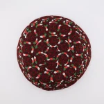 Detail of green and white silk accents on vintage Yomut embroidery