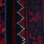 Hand-knotted Afghan Turkmen rug fringe and geometric border detail