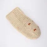 Detailed view of handmade traditional Gilaki pattern on 100% wool slipper socks – hand-knitted by Iranian artisans from Gilan province