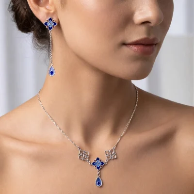 Handmade cloisonné enamel (Persian Minakari) silver jewelry set with blue floral necklace and dangling earrings on model