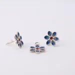 Handcrafted Persian silver pendant with vibrant blue cloisonné enamel flower