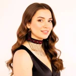 Model wearing red Baluchi embroidered choker and earrings