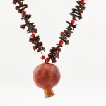ethnic handmade necklace with clove beads and pomegranate pendant
