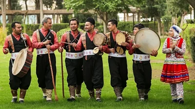 Gilani folk band in traditional dress playing regional instruments in northern Iran
